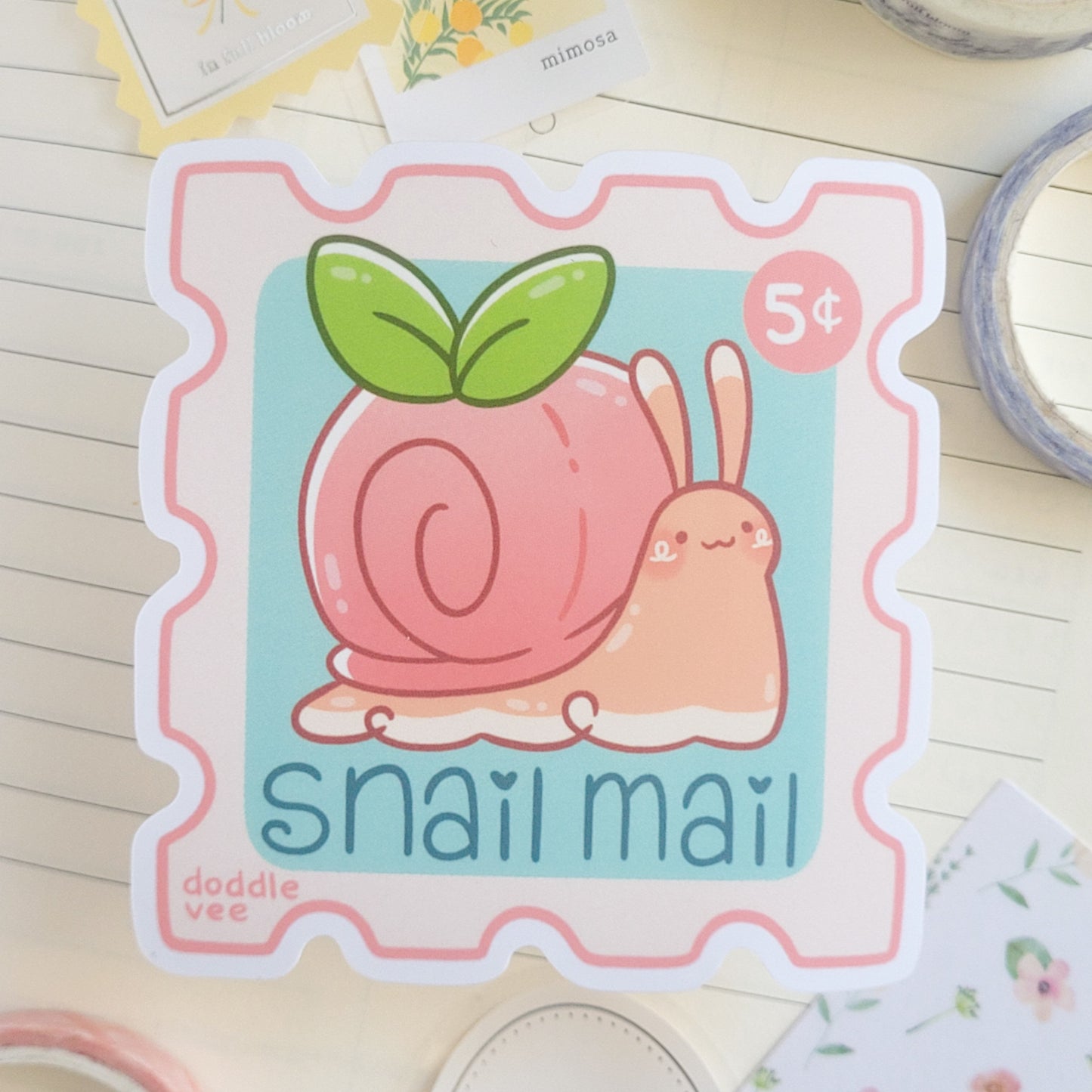 Sticker of a snail that's supposed to appear as a stamp sticker.