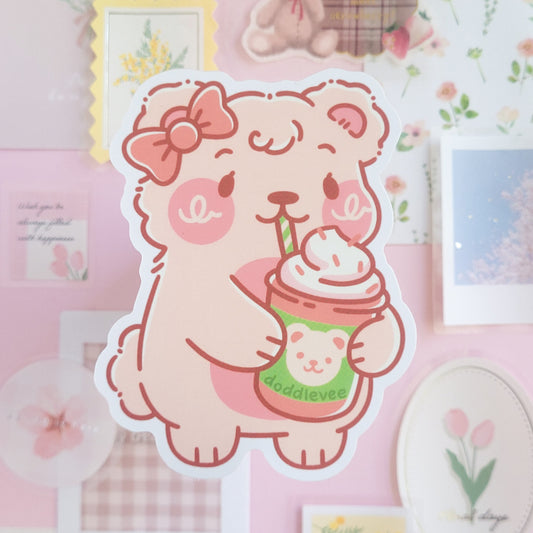 Sticker of white female bear holding and sipping a Frappuccino 