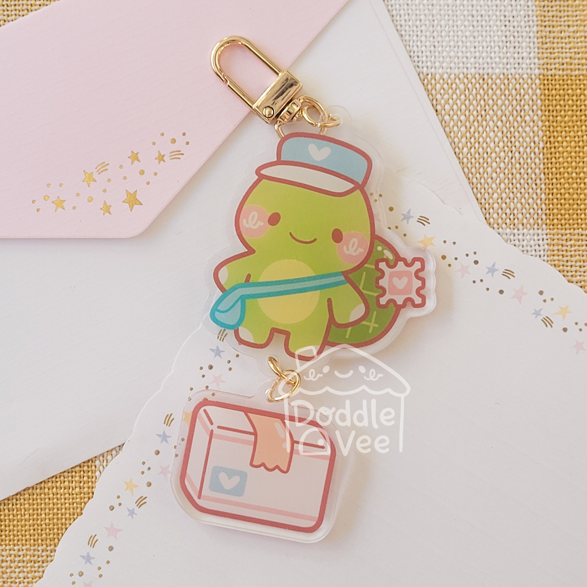 Link keychain of turtle and second link keychain is a package