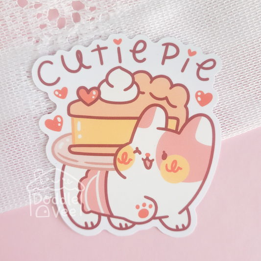 Cartoon cat holding a cake with 'Cutie Pie' text on a pink background
